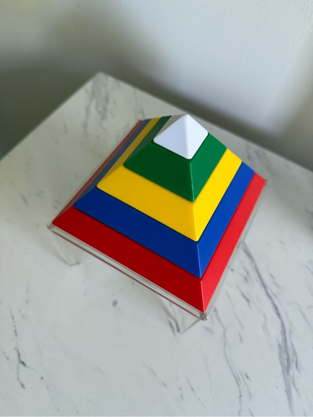 Stacking Pyramid Toy in Red, Blue, Yellow, Green & White